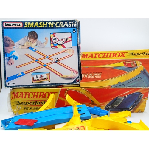 2462 - Matchbox SF2 loop set, SF14 curve pack and smash n Crash, all boxed with storage wear, unchecked. UK... 