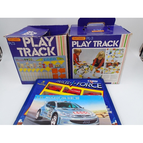 2465 - Two Matchbox PL-3 play track boxes, full of track, unchecked, plus Heller boxed Peugeot 306 kit and ... 