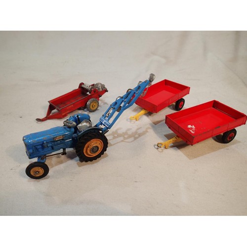 2365 - Corgi Toys Fordson power major with plough, plus three Dinky Toys trailers, fair to good condition, ... 