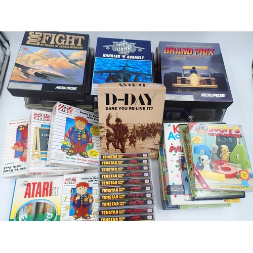 2506 - Twenty one boxed Atari ST games to include D-Day, Tenstar Games pack and three disc trays of back up... 