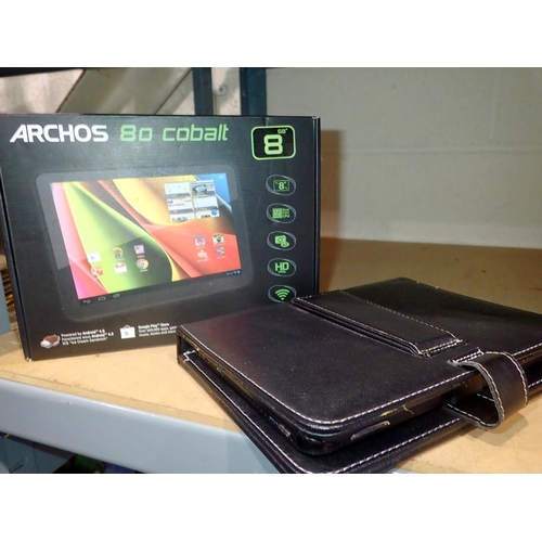 1015 - Boxed, working Archos 80 Cobalt tablet and another with USB keyboard. Not available for in-house P&P