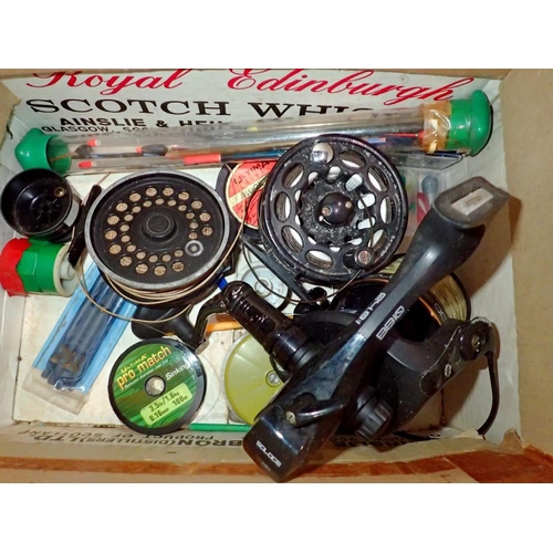 1022 - Lot of mixed fishing items including reels, floats, hooks and other related items. Not available for... 