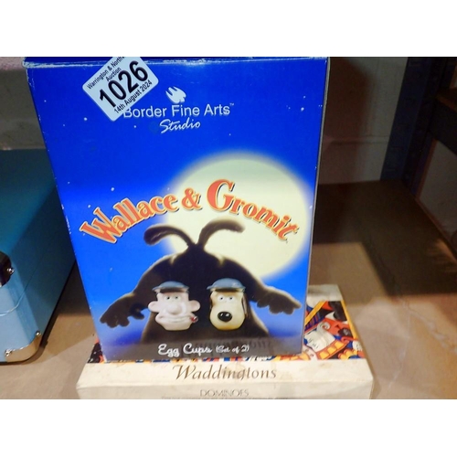 1026 - Boxed Wallace & Gromit egg cups by Border Fine Arts and Waddington's dominoes. Not available for in-... 