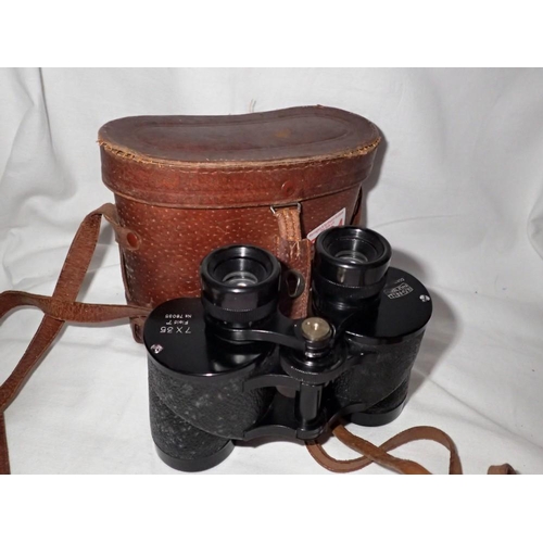 1155 - Bushnell coated binoculars in leather case. UK P&P Group 1 (£16+VAT for the first lot and £2+VAT for... 