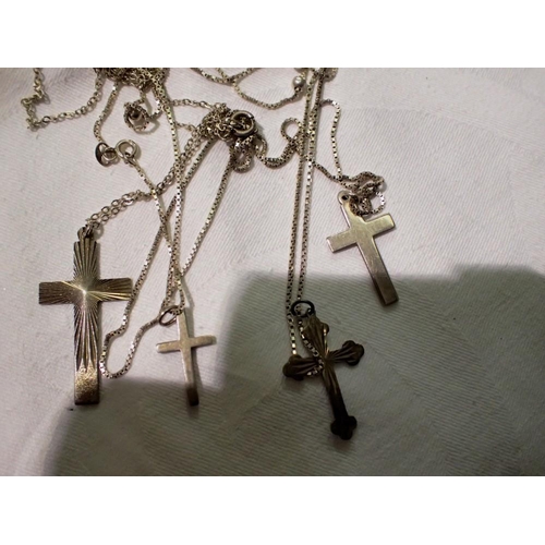 1161 - Four silver cross and chains. UK P&P Group 1 (£16+VAT for the first lot and £2+VAT for subsequent lo... 