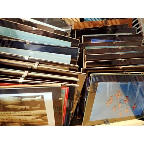 1242 - Collection of 29 framed air liner postcards and photographs. Not available for in-house P&P