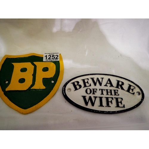 1252 - Beware of The Wife and BP cast iron signs, L: 17 cm. UK P&P Group 1 (£16+VAT for the first lot and £... 