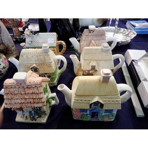 1257 - Collection of six novelty teapots, including a Coronation street Rovers return example. Not availabl... 