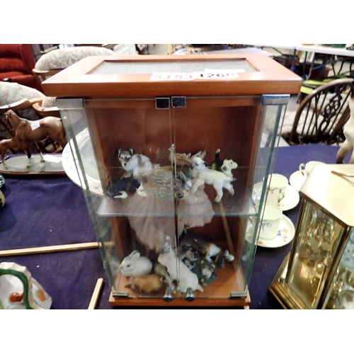 1260 - Glass display case with animals, including Beswick donkey and lamb. Not available for in-house P&P