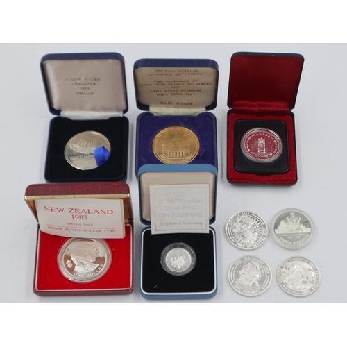 140A - Mixed sterling silver and silver plated commemoratives including a Davis Strait Canadian dollar, som... 