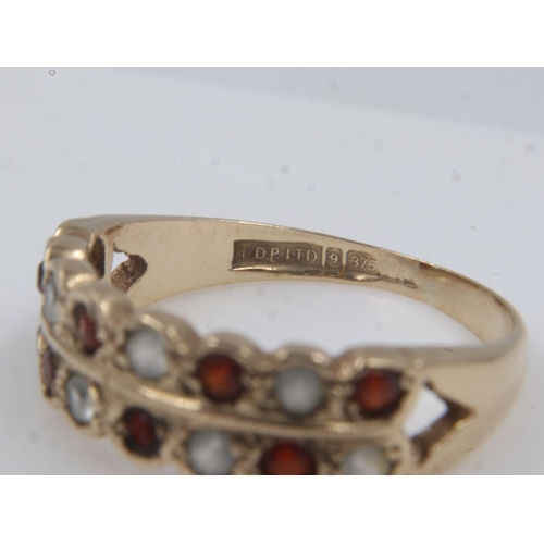 39 - 9ct gold ring set with garnet and cubic zirconia, size O, 2.7g. UK P&P Group 0 (£6+VAT for the first... 