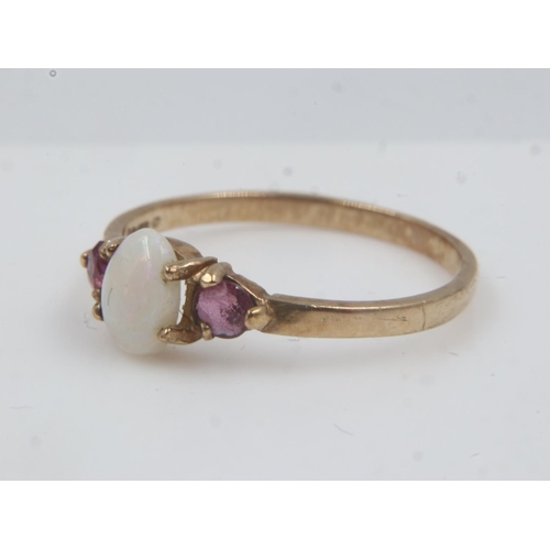 52 - 9ct gold ring set with an oval shaped opal, shouldered by amethyst, size N, 1.2g. UK P&P Group 0 (£6... 