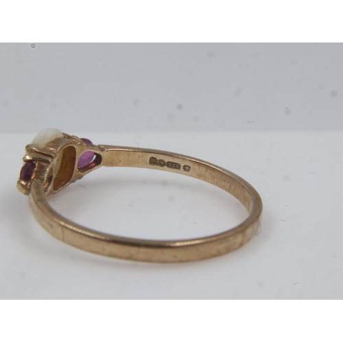 52 - 9ct gold ring set with an oval shaped opal, shouldered by amethyst, size N, 1.2g. UK P&P Group 0 (£6... 