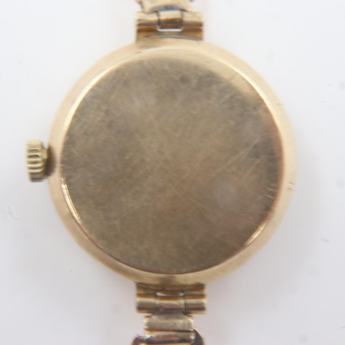 64 - LIMIT: Ladies 9ct gold cased wristwatch on a yellow metal bracelet. UK P&P Group 1 (£16+VAT for the ... 