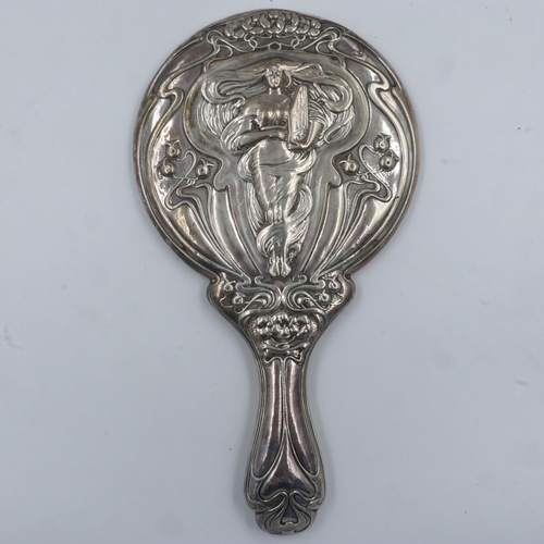 76 - An Art Nouveau hallmarked silver hand mirror, with figural design in relief, plaster filled, marks i... 