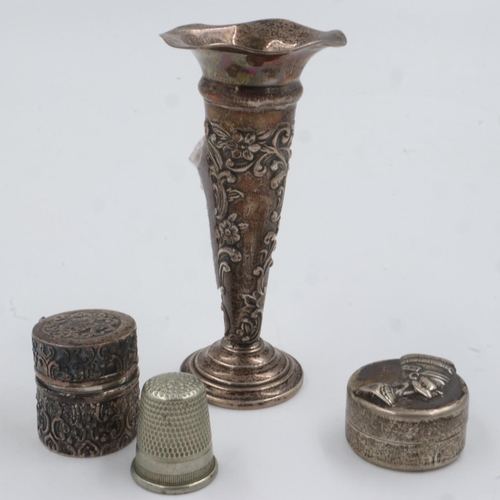 91 - A collection of 925 silver items to include a small bud vase (weighted base), Egyptian theme pill bo... 