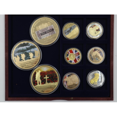 143 - Three large and six small gold plated military medallions in a wooden case. UK P&P Group 1 (£16+VAT ... 