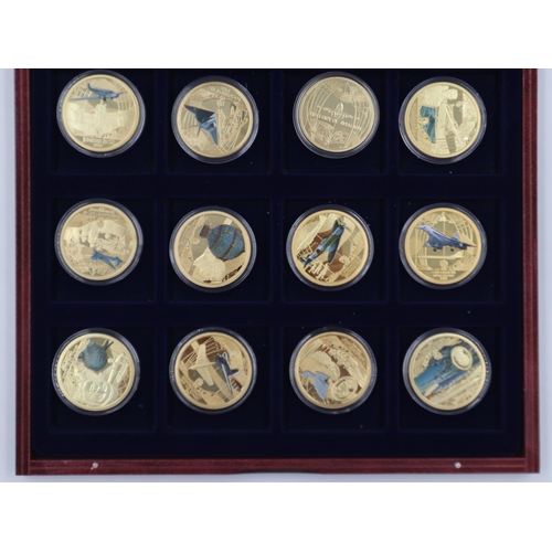 149 - History of Aviation gold plated coloured print twelve-medallion coin set in presentation case. UK P&... 