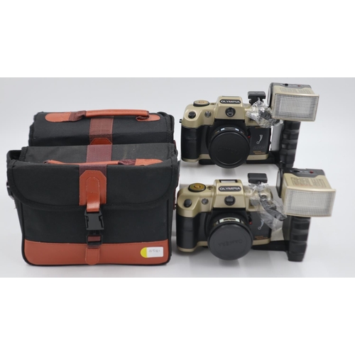 151 - Two Olympia Deluxe 35mm film cameras with flash units and carry cases. UK P&P Group 2 (£20+VAT for t... 