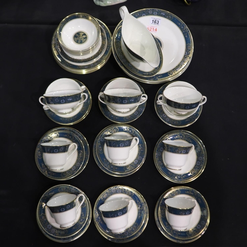 163 - Royal Doulton tea and dinner service in the Carlyle pattern, including six trios and other examples.... 