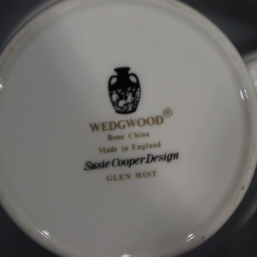 168 - Wedgwood Susie Cooper design coffee service, comprising 12 mugs, 12 saucers and a cake plate. Not av... 