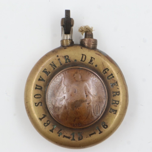 105A - RNAS interest: a WWI trench-art cigarette lighter, named to H B Riding RNAS, inscribed Souvenir de G... 