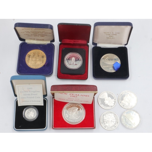 140A - Mixed sterling silver and silver plated commemoratives including a Davis Strait Canadian dollar, som... 