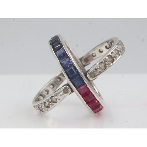 54A - Art Deco unmarked white metal flip ring, set with sapphires, rubies and white topaz, size N/O, 4.0g.... 