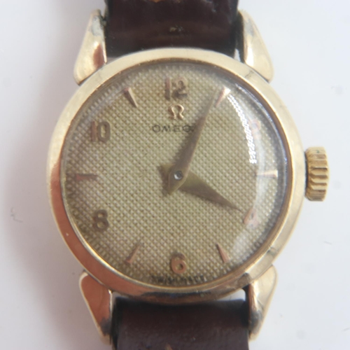 71A - OMEGA: ladies gold plated wristwatch on brown leather strap. UK P&P Group 1 (£16+VAT for the first l... 