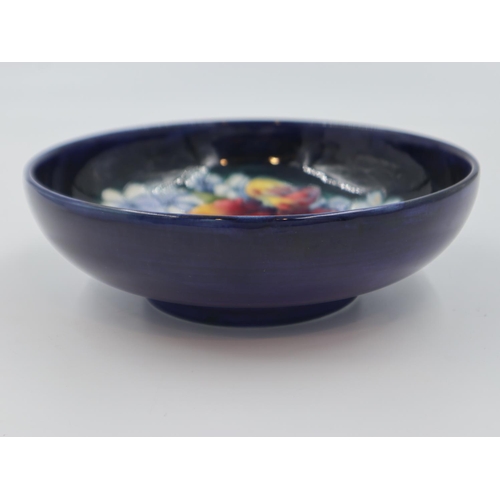 184 - Moorcroft bowl in the Orchid pattern, on a cobalt blue ground, 22cm D. UK P&P Group 2 (£20+VAT for t... 