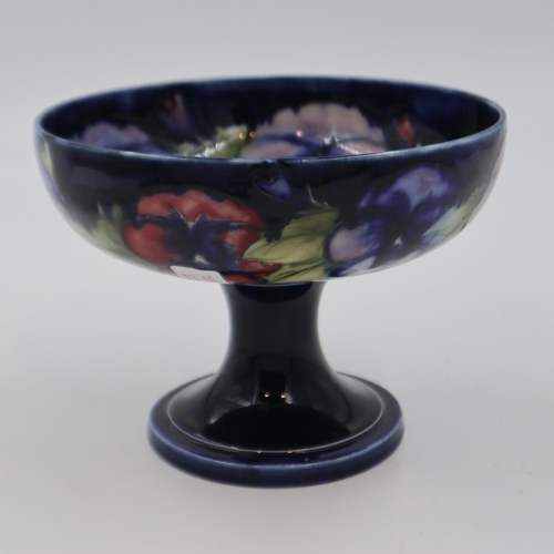 189 - Moorcroft pedestal bowl in the Anemone pattern, on a cobalt blue ground, 14.5cm H. UK P&P Group 2 (£... 