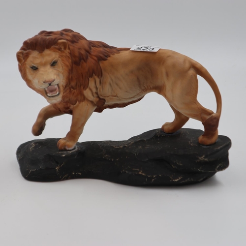 223 - Beswick lion on a rock, no cracks or chips, L: 30 cm. UK P&P Group 2 (£20+VAT for the first lot and ... 