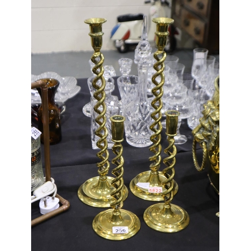 256 - Two pairs of 19th century brass twist candlesticks, largest pair H: 48 cm. UK P&P Group 2 (£20+VAT f... 