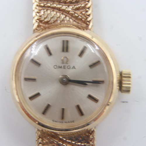 74 - OMEGA: ladies 9ct gold cased wristwatch with 9ct gold bracelet, boxed with paperwork dating the watc... 