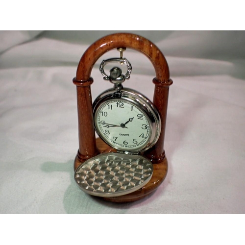 1169 - Modern quartz full hunter pocket watch on a polished walnut stand, working at lotting. UK P&P Group ... 