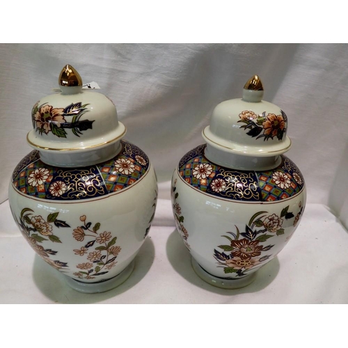 1358 - Pair of modern Chinese covered jars. Not available for in-house P&P