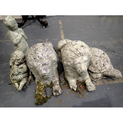 1810D - A pair of reconstituted stone recumbent lions (one with damages), tortoise and two further ornaments... 