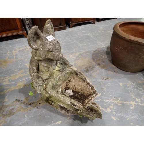 1810F - Large reconstituted anthropomorphic pig pushing a wheelbarrow, H: 58 cm. Not available for in-house ... 