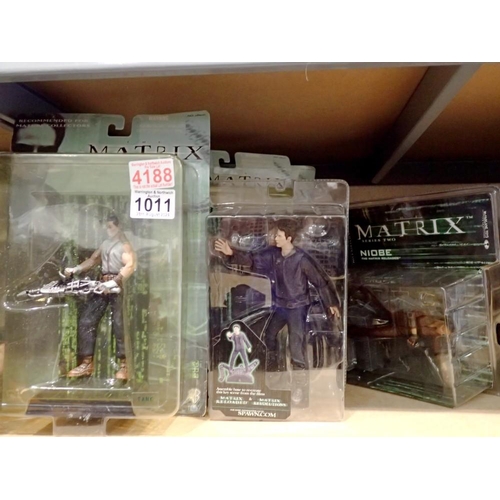 1011 - Collection of seven Matrix action figures in unopened packaging and a Star Wars Kylo Ren figure, als... 