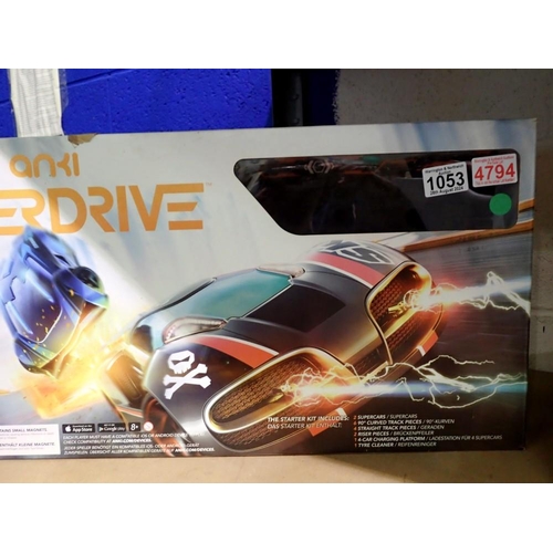 1053 - Boxed Awki overdrive racing car starter kit, unchecked for completeness. Not available for in-house ... 