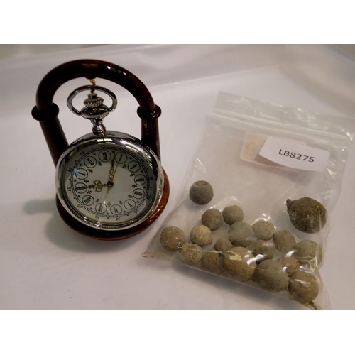 1075 - Pocket watch presented on wooden stand - working at lotting up. UK P&P Group 1 (£16+VAT for the firs... 