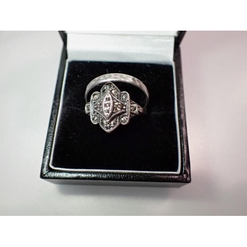 1137 - Two silver rings, including a marcasite example. UK P&P Group 1 (£16+VAT for the first lot and £2+VA... 