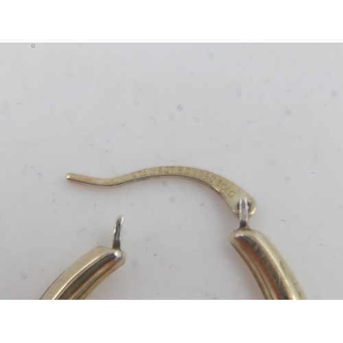 16 - Pair of 9ct and silver gold large hoop earrings, 1.6g. UK P&P Group 0 (£6+VAT for the first lot and ... 