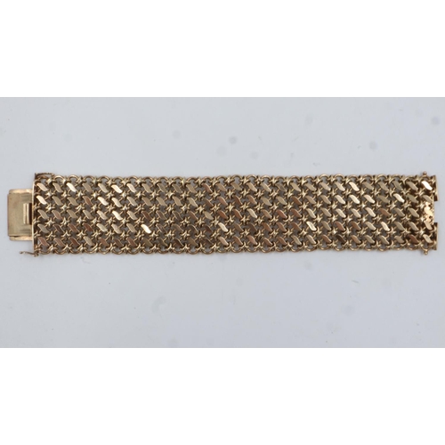 2 - Heavy gauge 9ct gold mesh-link articulated bracelet, W: 35 mm, L: 200 mm, 92.4g. UK P&P Group 0 (£6+... 