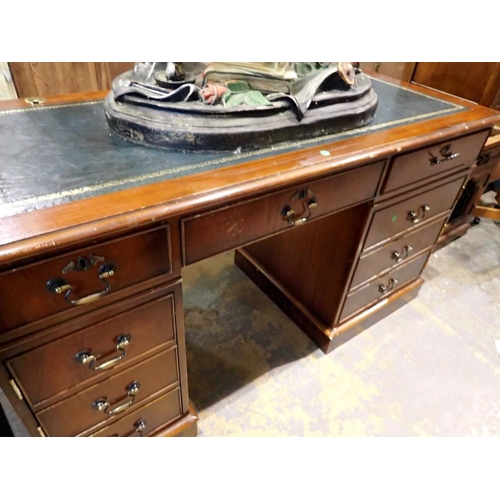 1687 - Large mahogany twin pedestal desk with green leather inset top, 142 x 80 cm H. Not available for in-... 