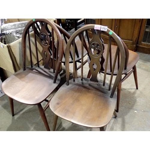 1707 - Set of four Ercol elm seated  dining chairs with Fleur De Lys backs. Not available for in-house P&P