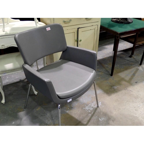 1719 - Grey faux leather and chrome armchair. Not available for in-house P&P