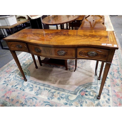 1726 - Mahogany side table inlaid with brass, serpentine fronted raised on tapering supports with spade fee... 