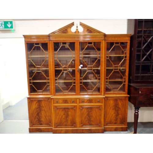 1741 - Large mahogany glazed breakfront bookcase with broken arch pediment and cupboards below, 212 x 225 c... 