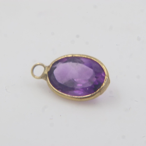 56 - Natural oval cut amethyst 9ct gold bezel set charm pendant. UK P&P Group 0 (£6+VAT for the first lot... 